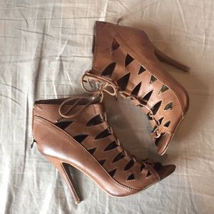 Lace up caged heels